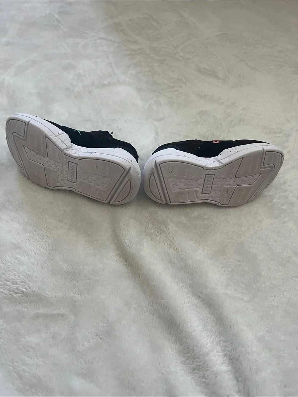 Reebok Kids Black Slip-On Sneakers with Rainbow Logo Accent